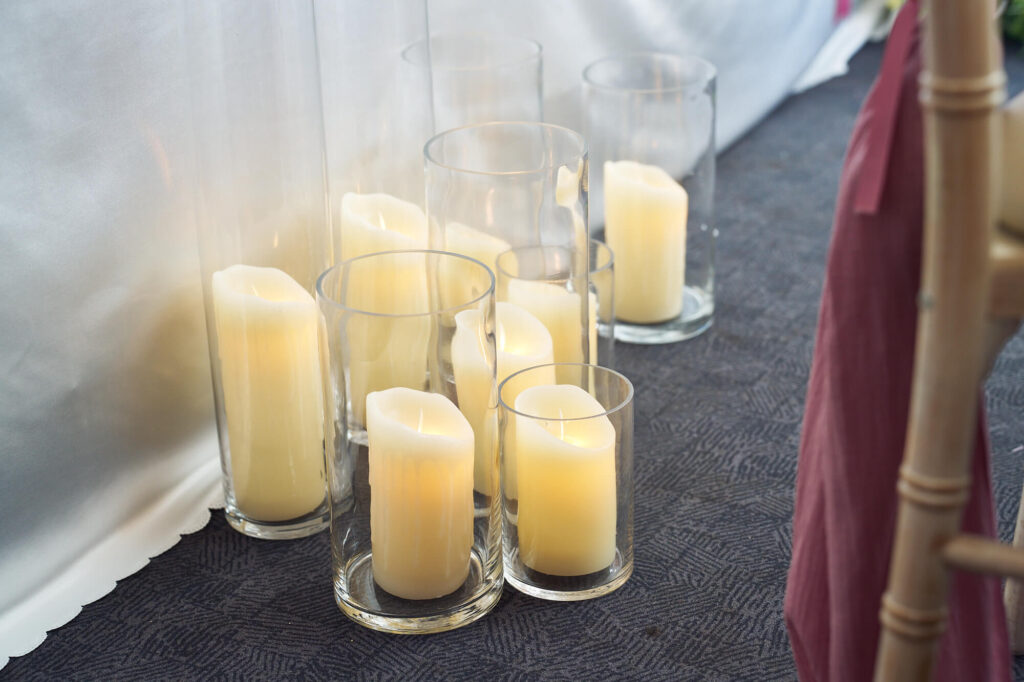 Dream Hire & Deco styling Garden House wedding venue with refined, classic table arrangements and LED candles.