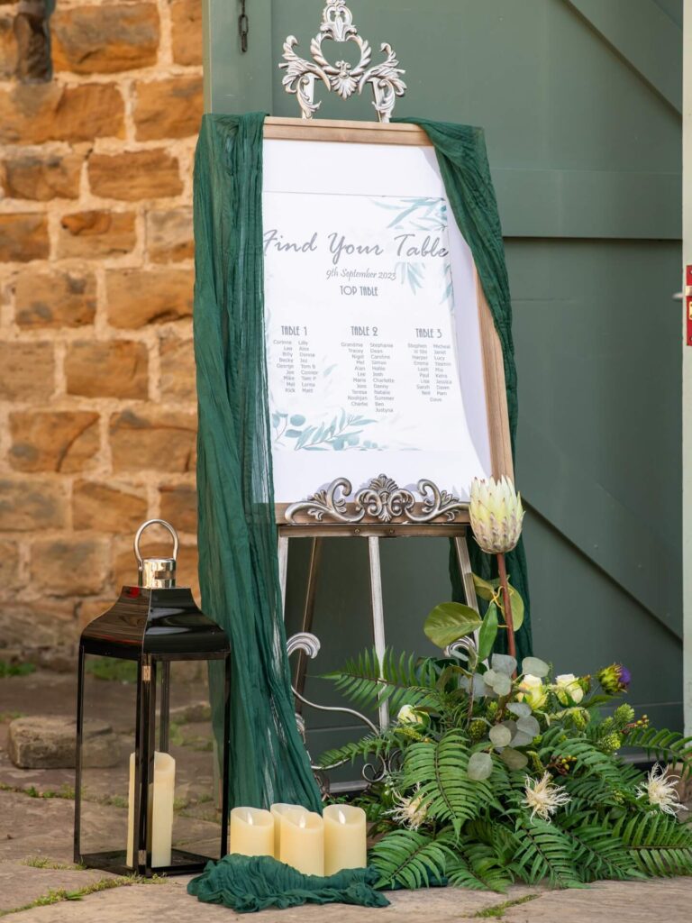 Personalised signage for wedding day, including seating chart and welcome board.