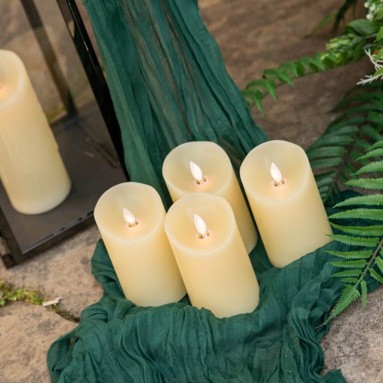 Rustic wooden directional signage for wedding ceremony, set on grass with floral details.