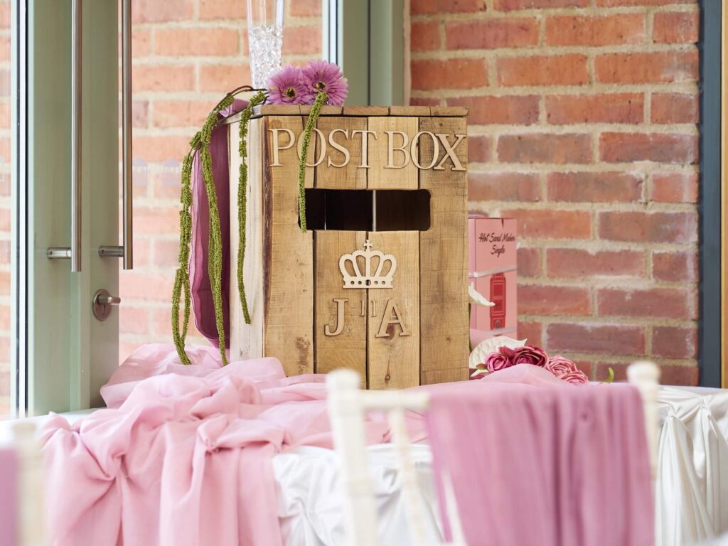 Rustic wooden Wedding Post Box on a decorated card table