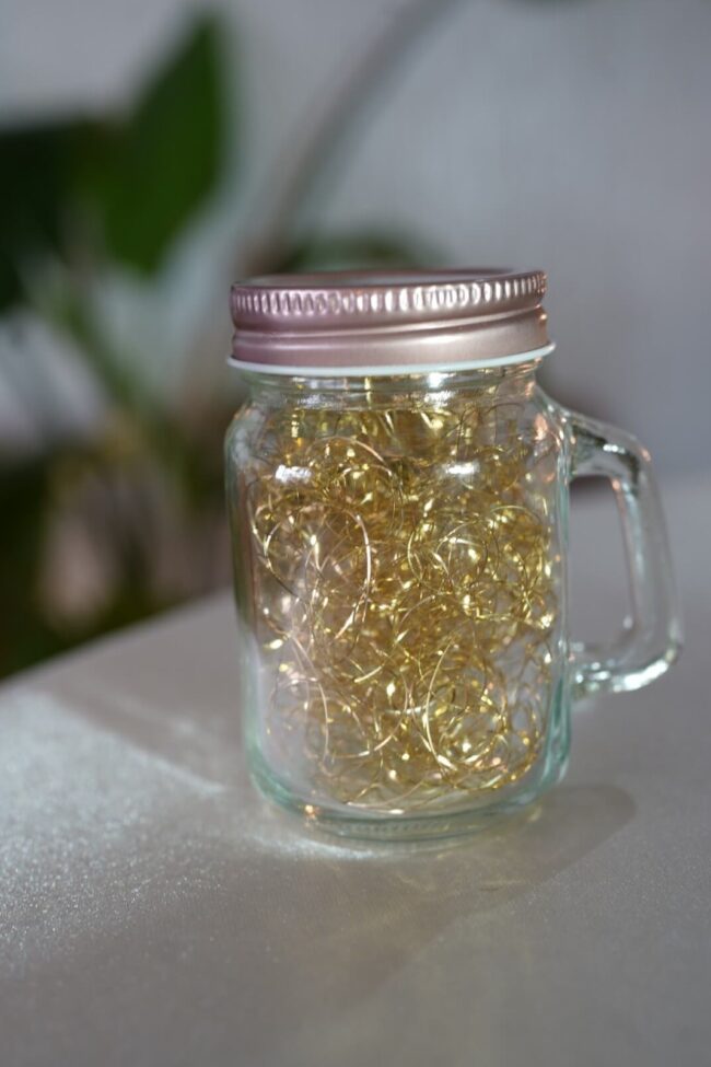 Mason jar hire with handle, lid and decorative lights