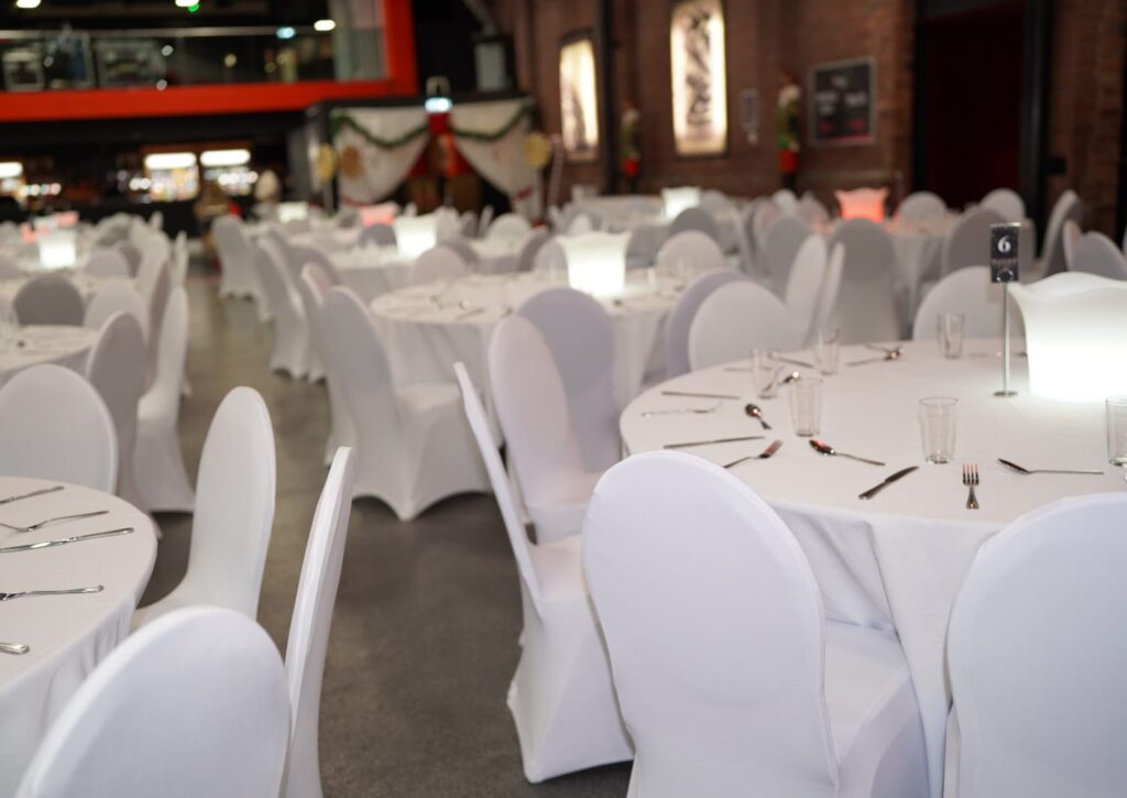White chair covers for hire at a party venue