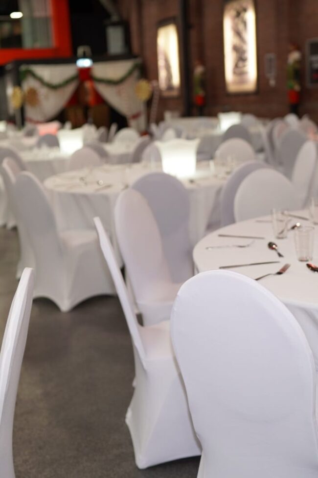 White chair covers for hire at a party venue