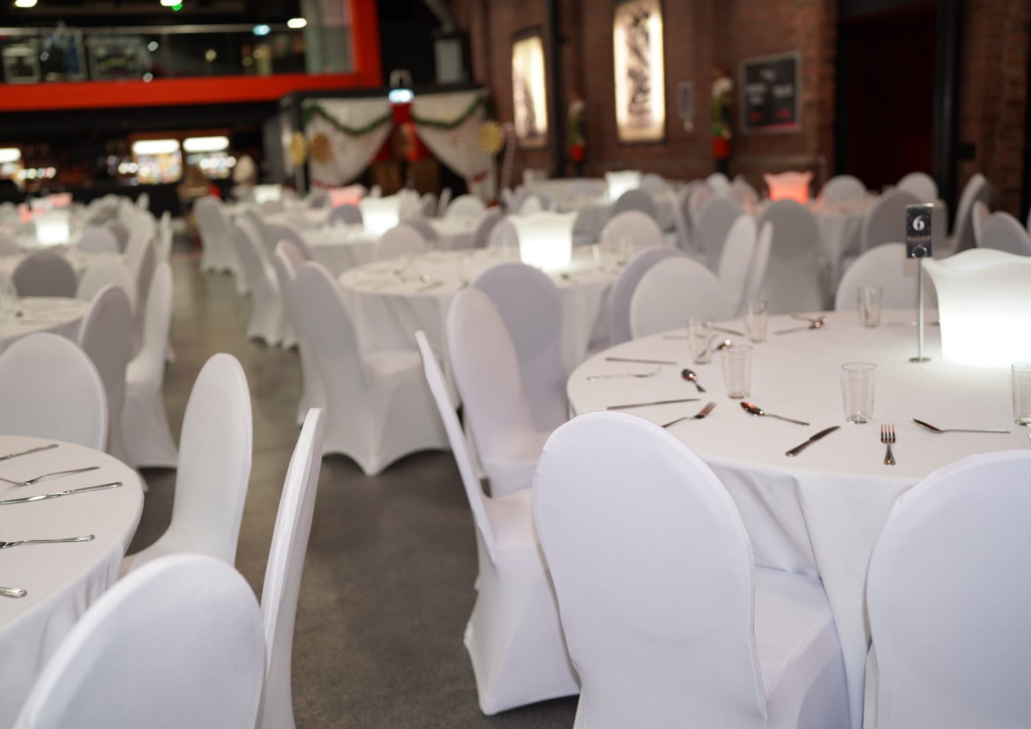 White chair covers for hire at a party venue