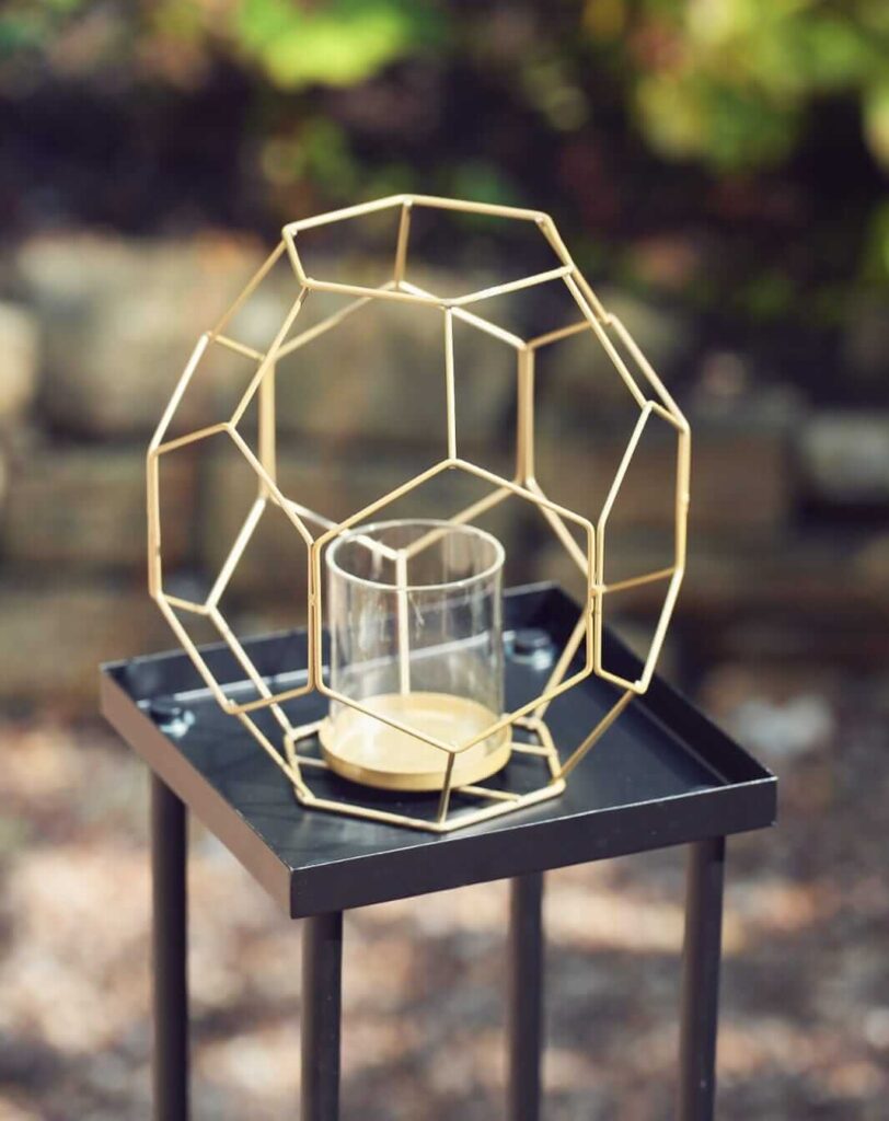 Gold geometric lantern with clear inner glass holder