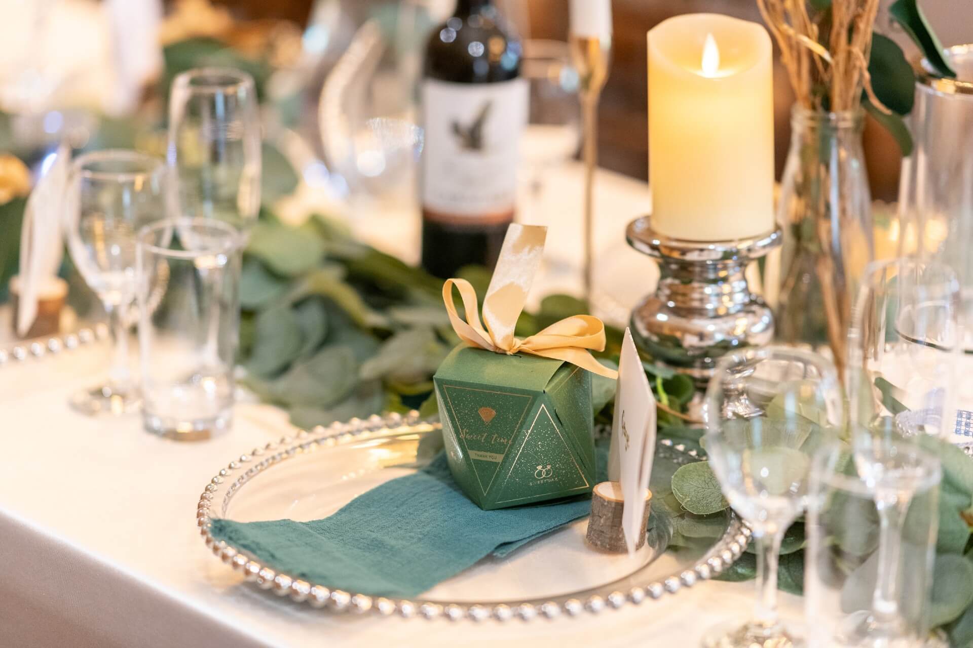 pillar candlestick in silver finish with pillar candle