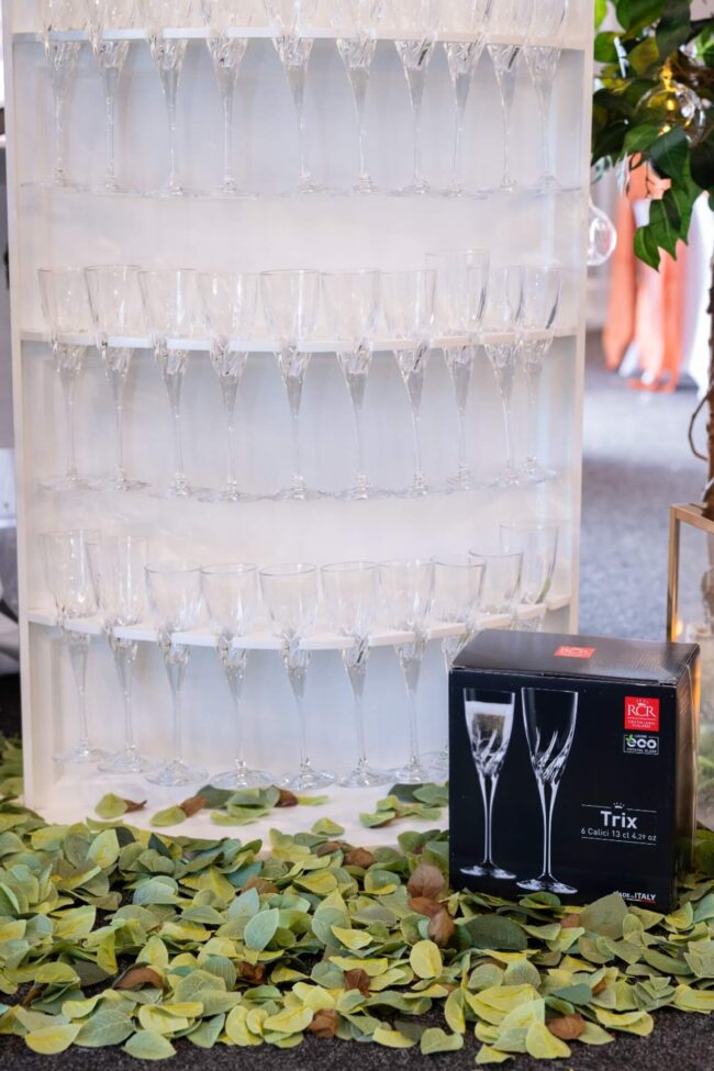 Champagne wall hire, close-up of flute holders on display