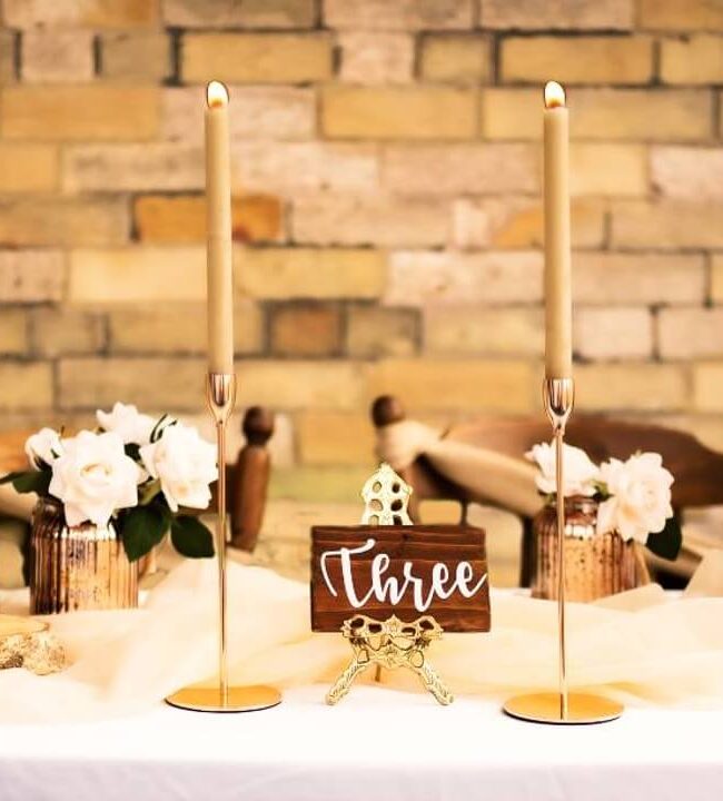rustic wooden table numbers used on a styled table display