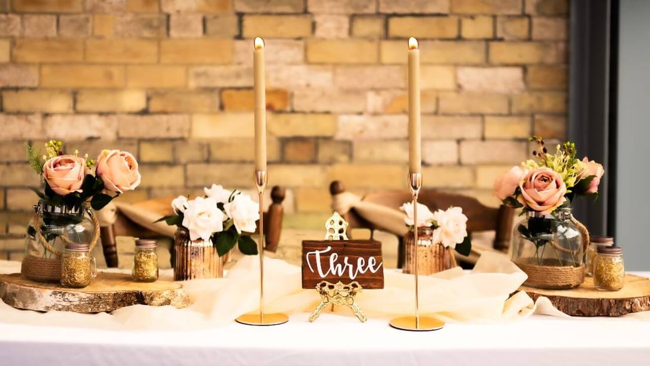 rustic wooden table numbers used on a styled table display
