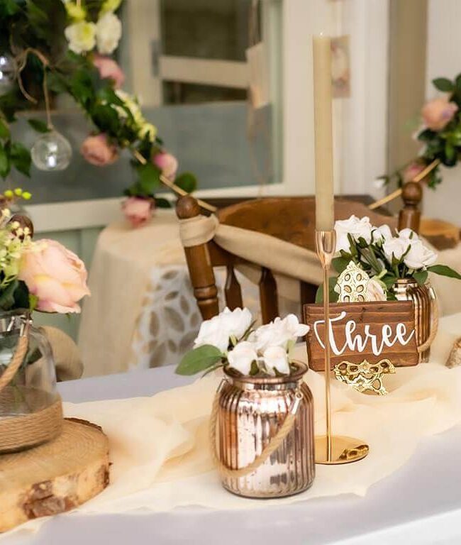 wooden block table numbers close-up showing “three” display
