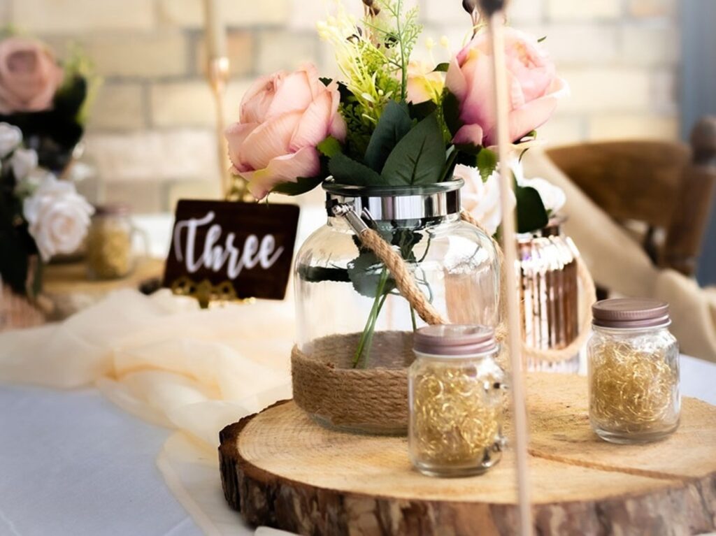 Clear jute handle glass vase with a rounded jar-shaped body