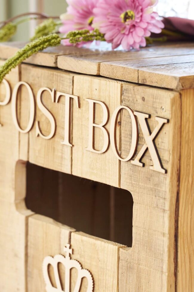 Rustic post box wooden wedding post box close-up showing post slot
