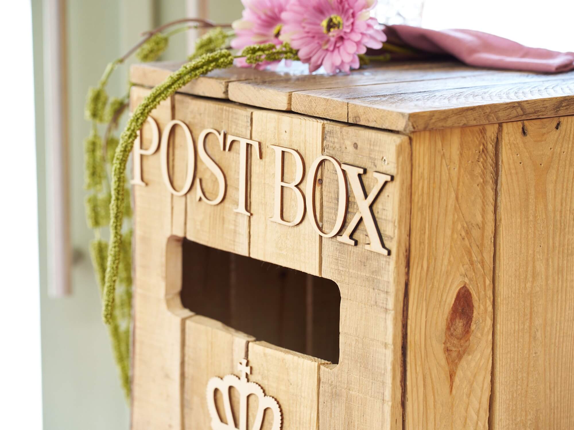 Rustic post box wooden wedding post box close-up showing post slot