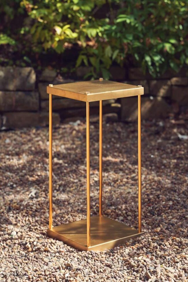 Gold plinth hire with a 50cm open metal frame