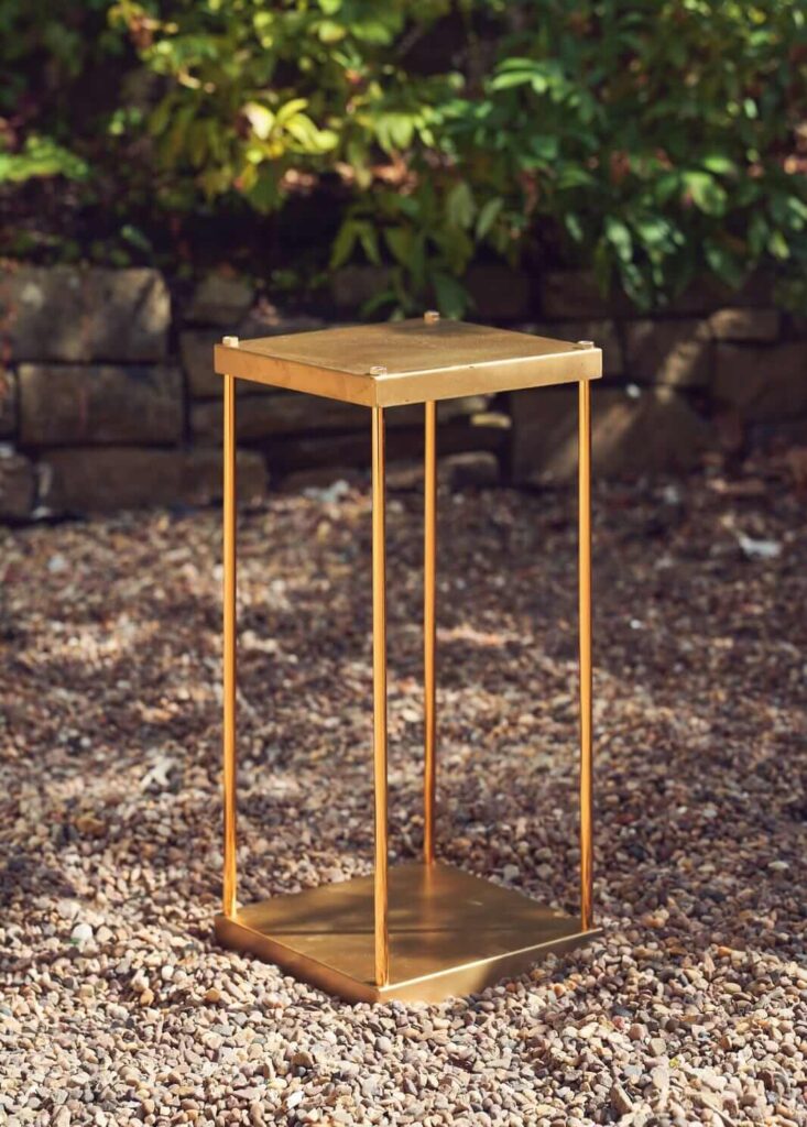 Gold plinth hire with a 50cm open metal frame
