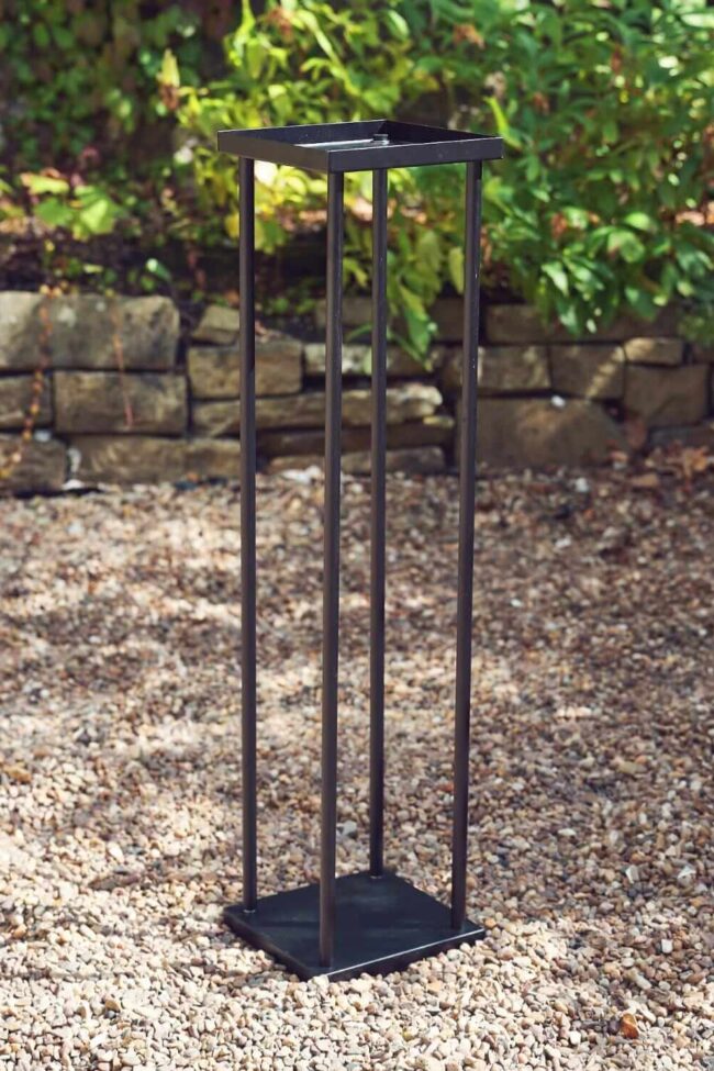 Black plinth hire with an 80cm open metal frame