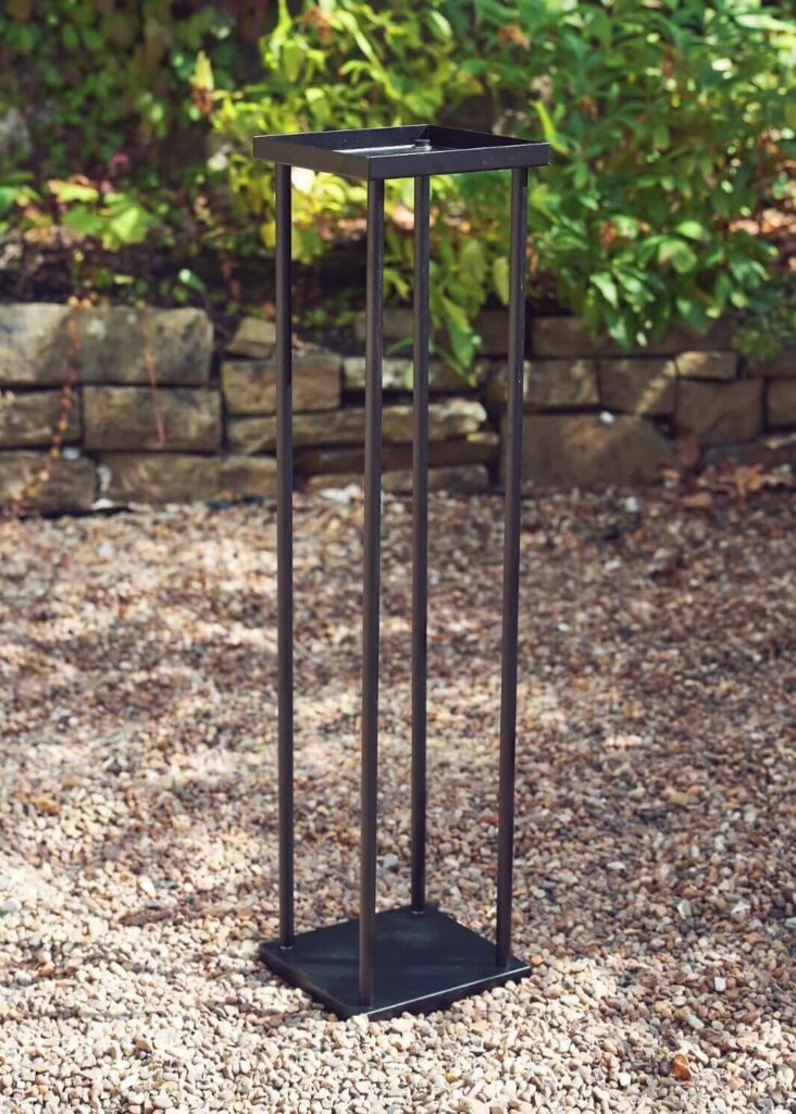 Black plinth hire with an 80cm open metal frame