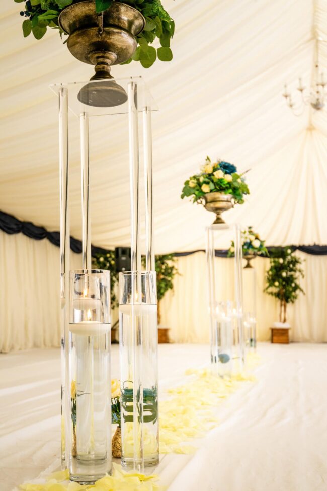 1m acrylic display pedestal supporting a raised feature