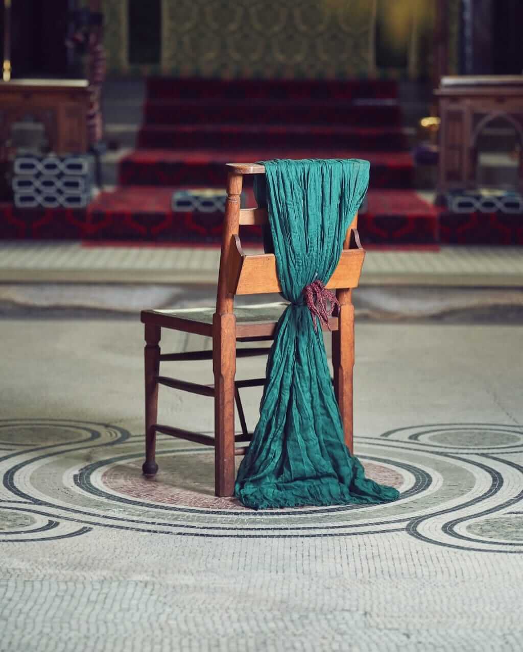 Green chair drape styled in a centred full-length fall