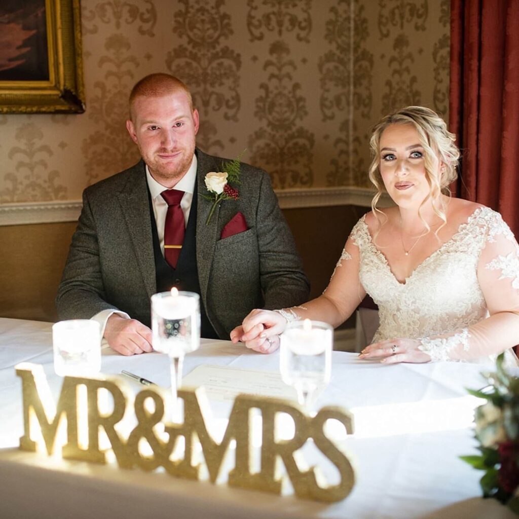 Bride and groom sharing a moment at their wedding ceremony