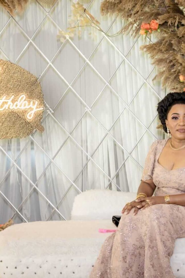 Neon happy birthday sign on party backdrop setup