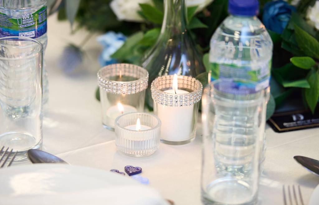 Candle holders and table accessories displayed as part of events props rental decor.