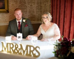 Bridal chair decoration idea for sweetheart table seating with Mr & Mrs sign