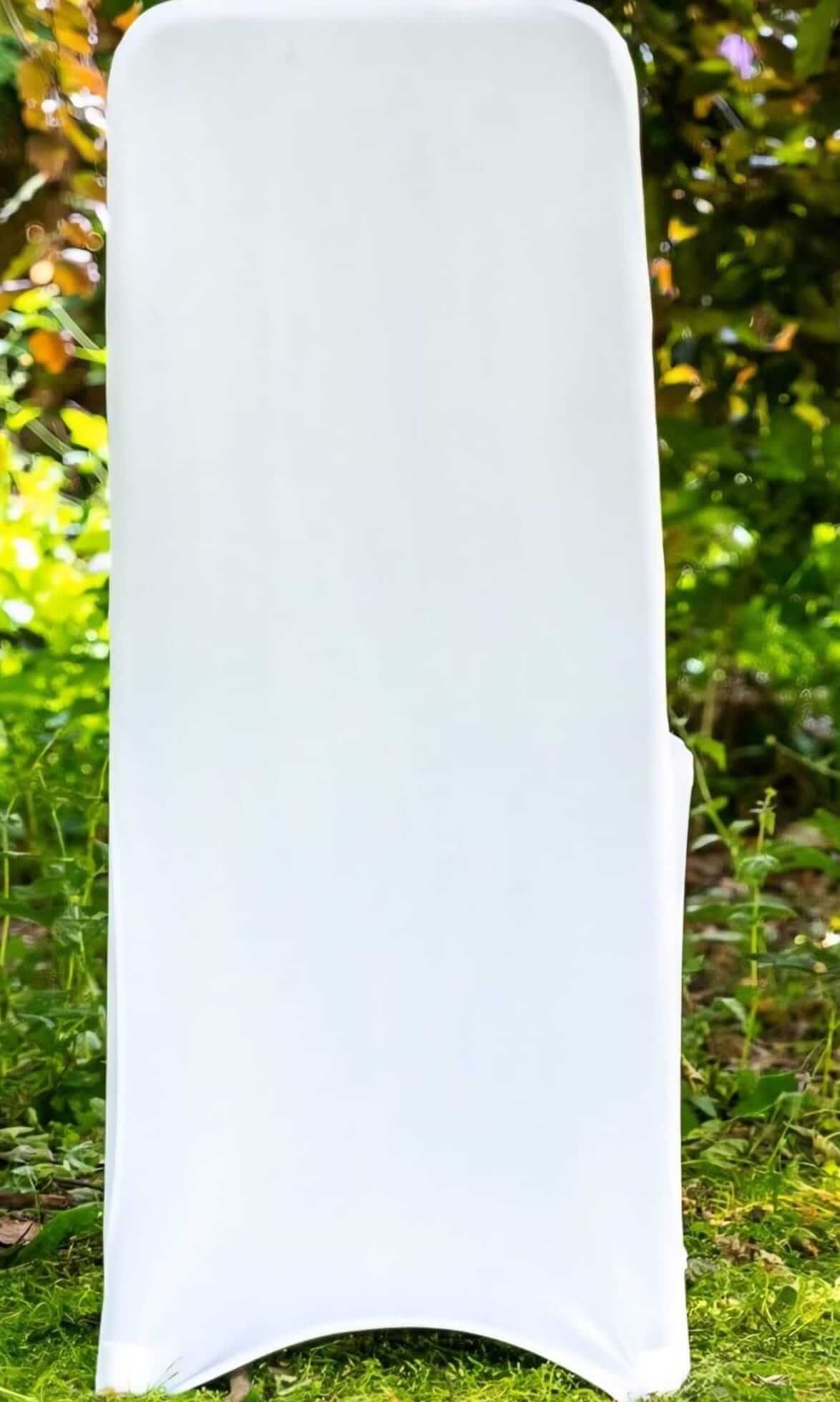 White chair covers fitted neatly on standard banquet chairs