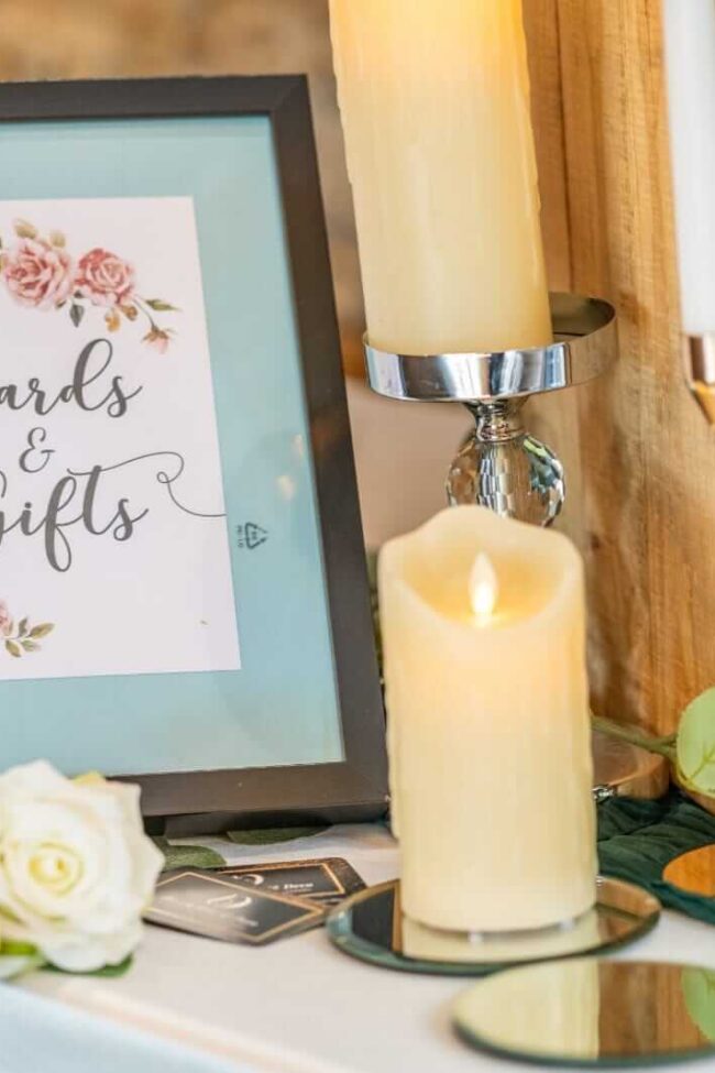 Cards and gifts sign on a wedding gift table with a post box