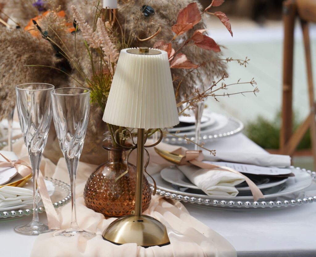 Rechargeable table lamp on a decorated dining table