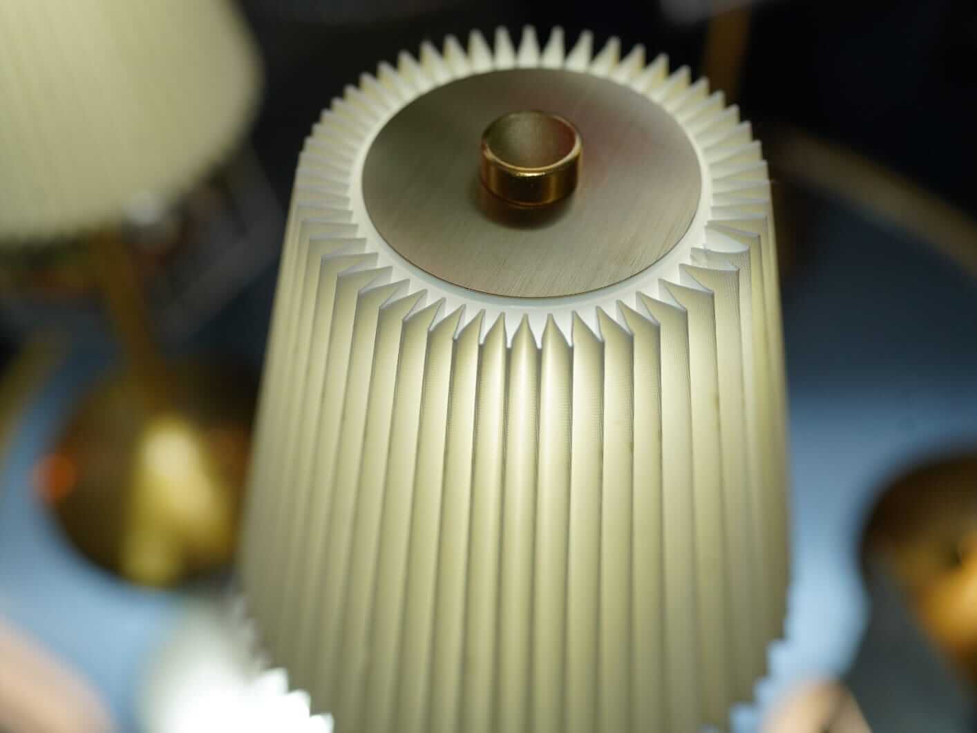 Rechargeable table lamp shade detail with soft warm glow