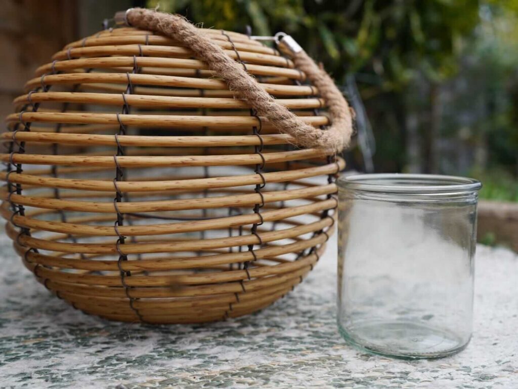 rustic rattan lantern with glass insert for candlelight