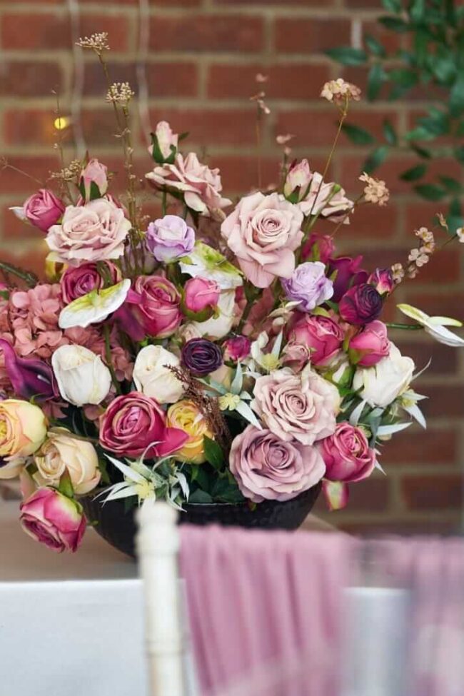 Flower aisle decor arranged as a bespoke ceremony floral display