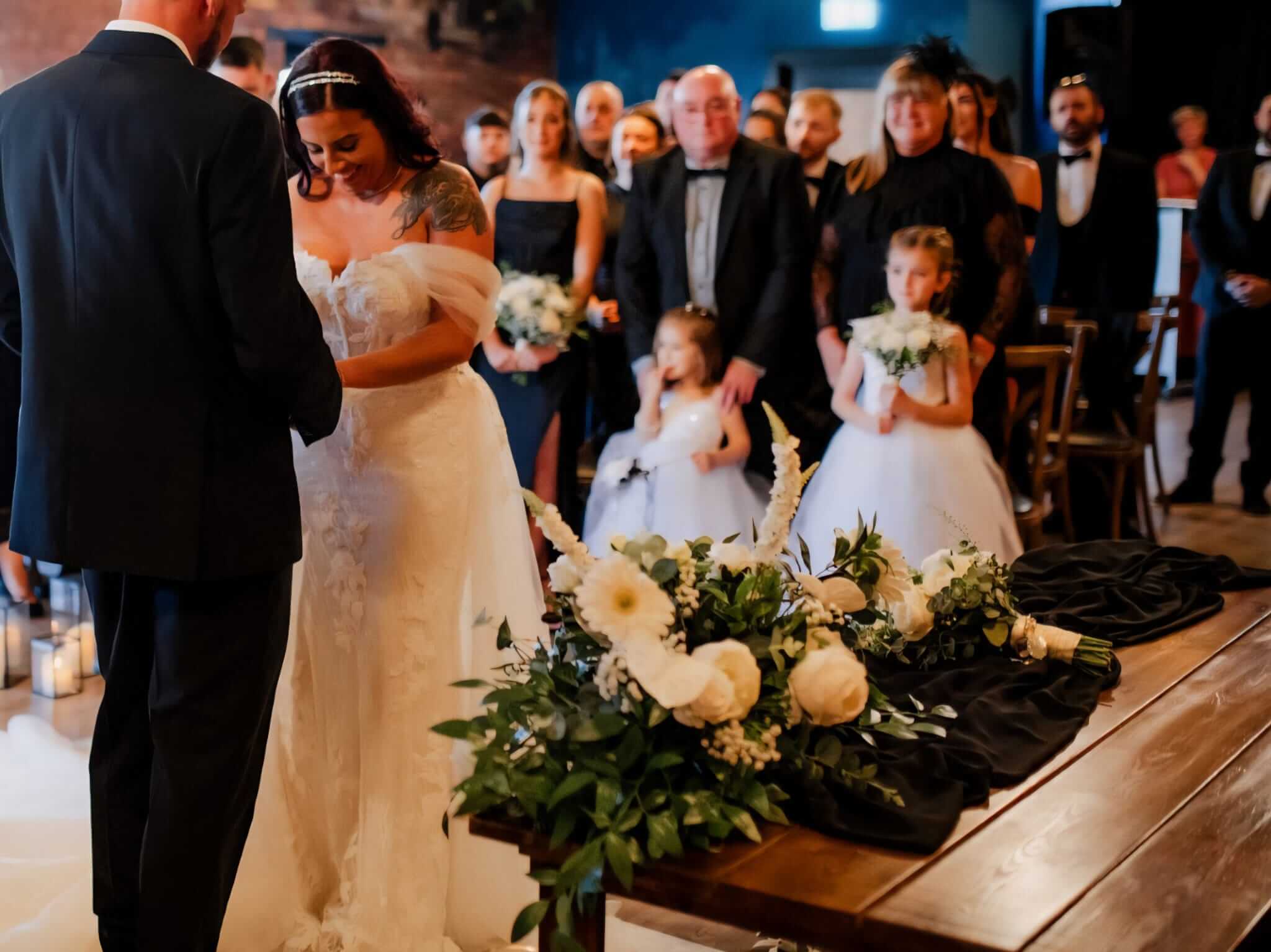 Top table flower arrangement styled for a wedding ceremony table