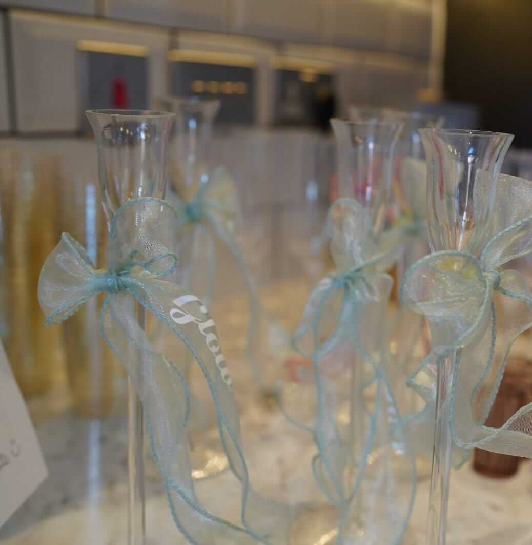 Personalised ribbon names styled on wedding glassware for table place settings