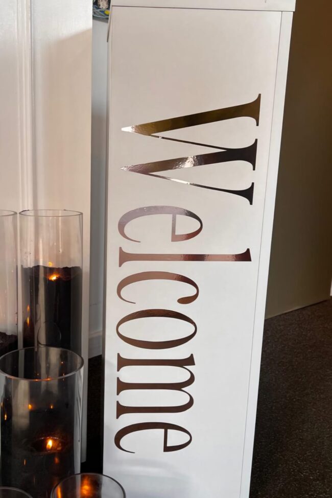 White plinth hire with a tall solid display column
