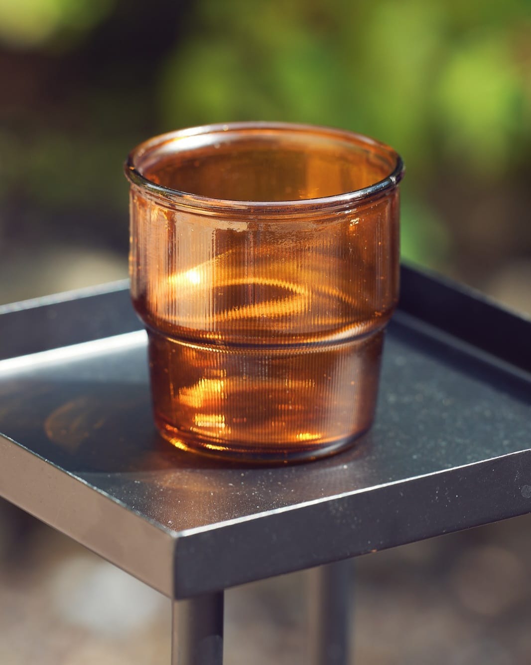 Amber tealight holder with warm translucent glass finish